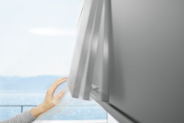TIP-ON de Blum, ouverture mécanique des portes relevables